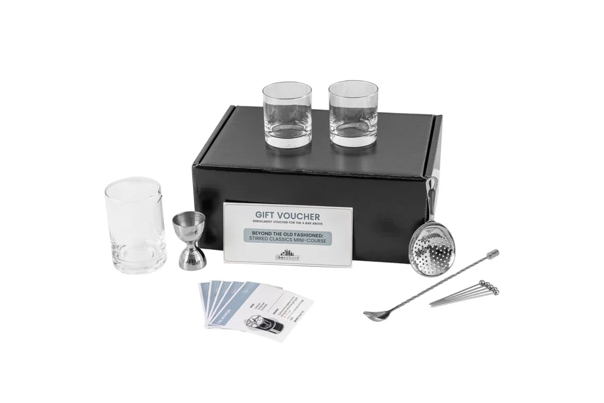 A Bar Above Old Fashioned Gift Box with rocks glasses, mixing glass, jigger, strainer, bar spoon, picks and recipe cards