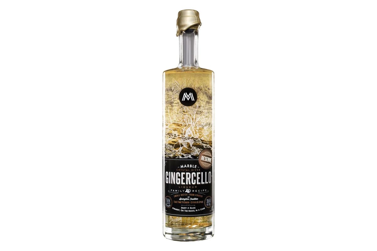 Bottle of Marble Distilling Gingercello Reserve with a gold wax top and black Gingercello label marked Reserve