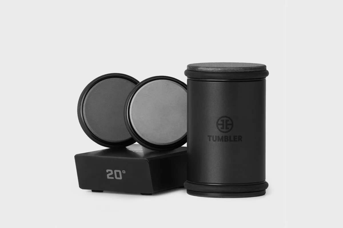 Black Tumbler Pro rolling knife sharpener with two whetstone discs and a 20 degree magnetic angle block