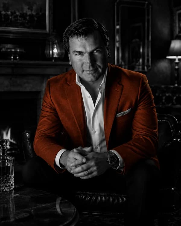 Rob B., founder of Boozemakers, with a glass of whiskey